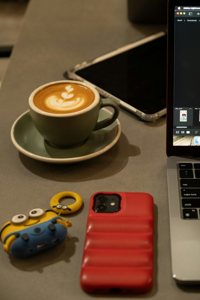 best remote work tools in 2025 with laptop, mug, plant, and cloud icons."
