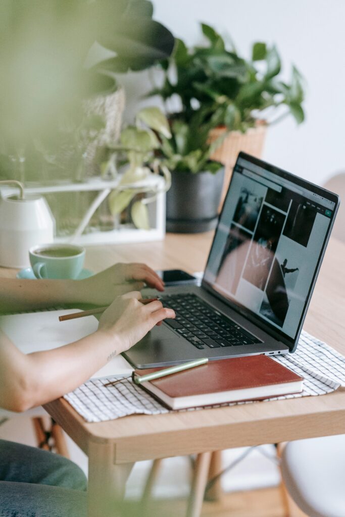 Feature image showing a laptop with productivity icons and the title 'The Ultimate Guide to Time Management for Remote Workers'.